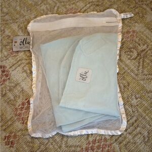 Ollie swaddle light blue/ green